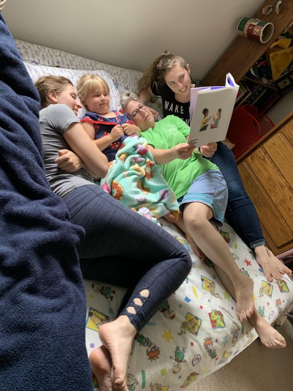 Reading Bedtime Stories to Our Niece