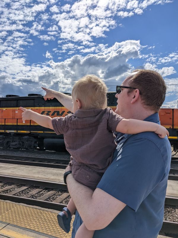 Curtis & Our Nephew Checking Out a Train
