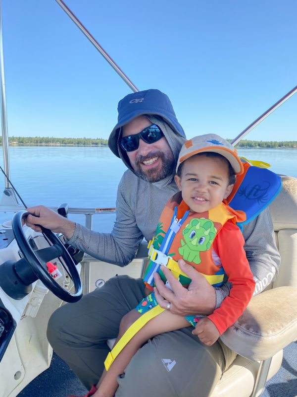 Helping Uncle Frank Drive the Boat