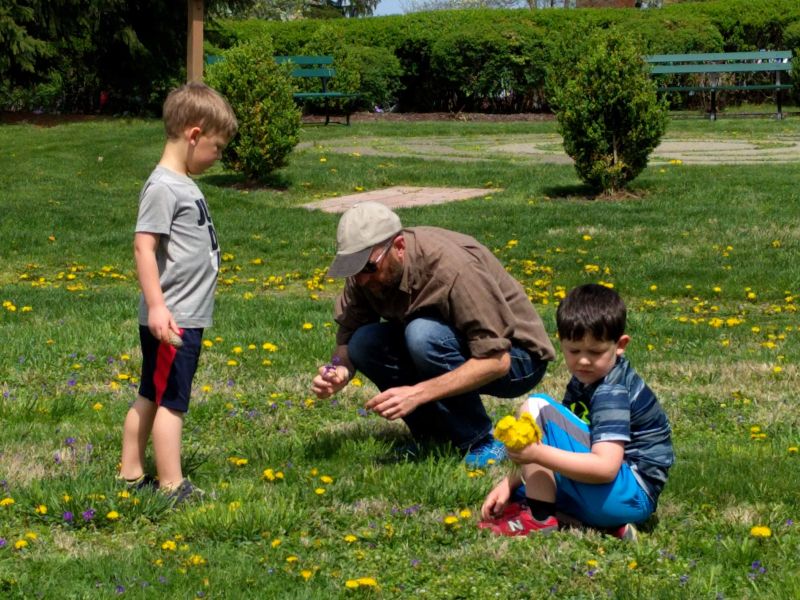 Helping the Boys Pick Flowers For Their Mom