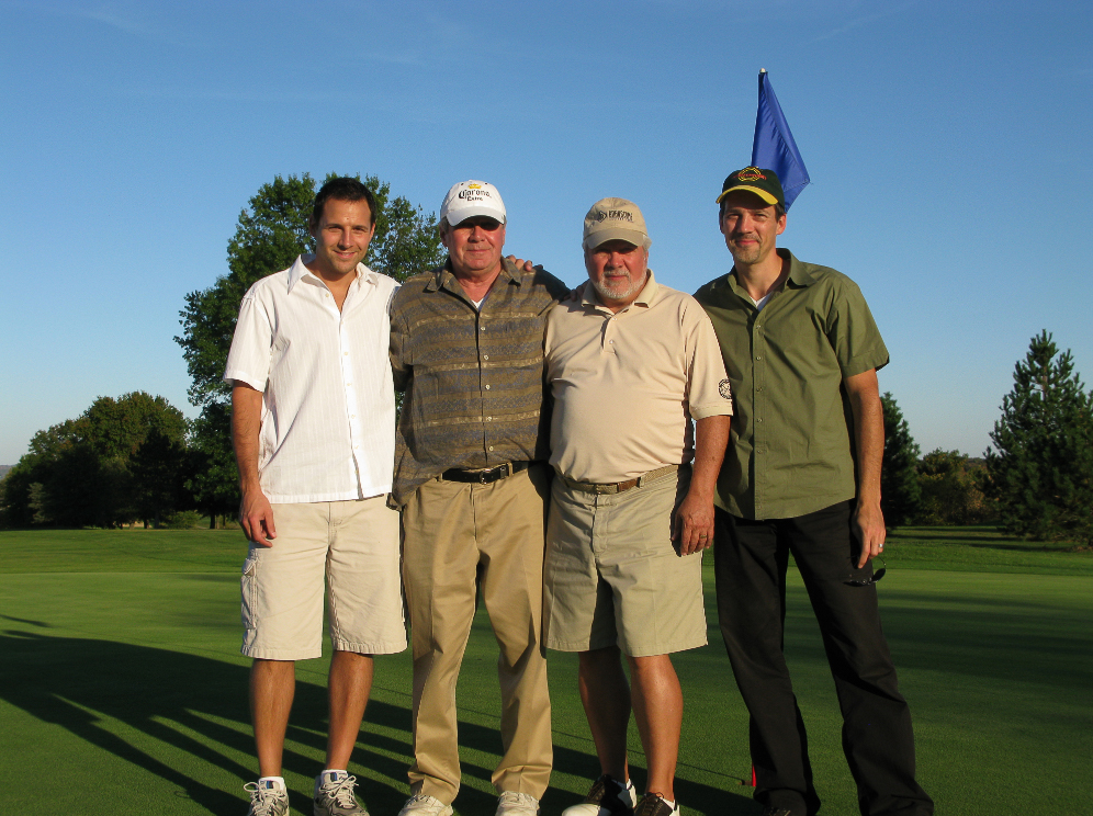 Tom Golfing with His Dad, Brother and Uncle