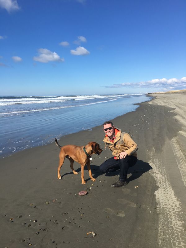 At the Beach Playing Stick