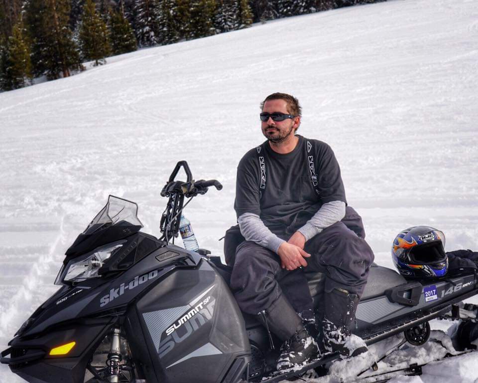 Kevin Taking a Break From Snowmobiling