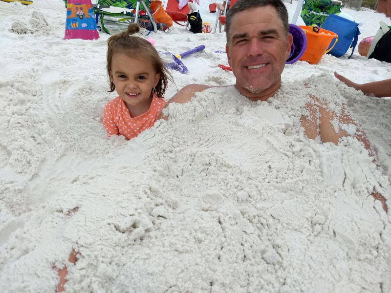 Annie and Nick Buried at the Beach